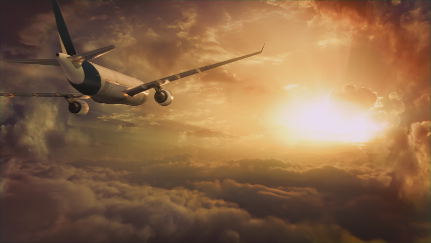 Jet flying towards a golden sunset cloudscape, above the clouds. 4k footage. Royalty-Free Stock Footage #1071822271