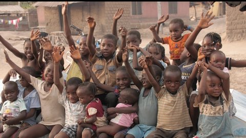 24th March  2021, Abuja Nigeria: Happy African village children singing infront  of camera