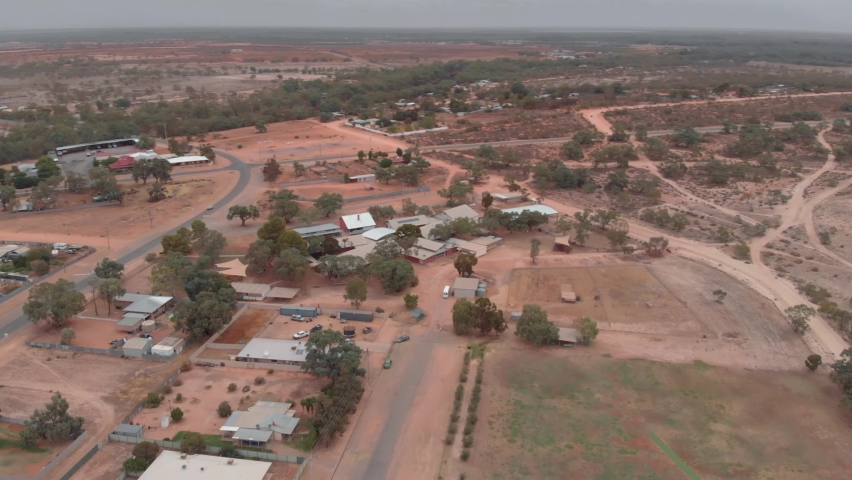 Rural School building in a remote Australian town in the Outback desert of Australia (drone areial view over Menindee town) Royalty-Free Stock Footage #1071904588