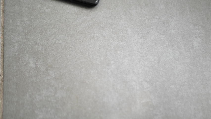broken phone screen lying on the floor, a Technology Video by Petro Artem