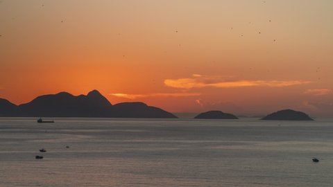 Time Lapse Of Sun Rising Behind Mountains Over Atlantic Ocean, Rio De Janeiro, Brazil