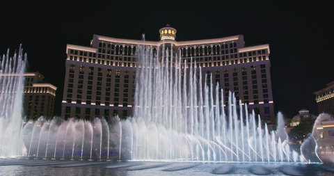 Las Vegas, Nevada USA, March 2021. Capital of night life and adult entertainments. Dancing fountain water show at night. Fountains at Bellagio Resort and Casino on world famous Las Vegas the Strip