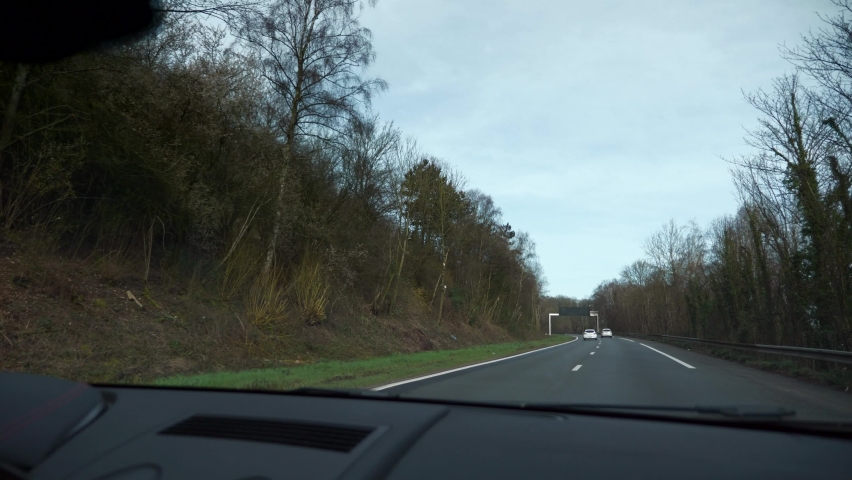 4K 60p Empty Highway Expressway Suburban Road. Coronavirus Lock-down Quarantine. Travelling by Car Windshield Hood POV. France Europe Royalty-Free Stock Footage #1071937423