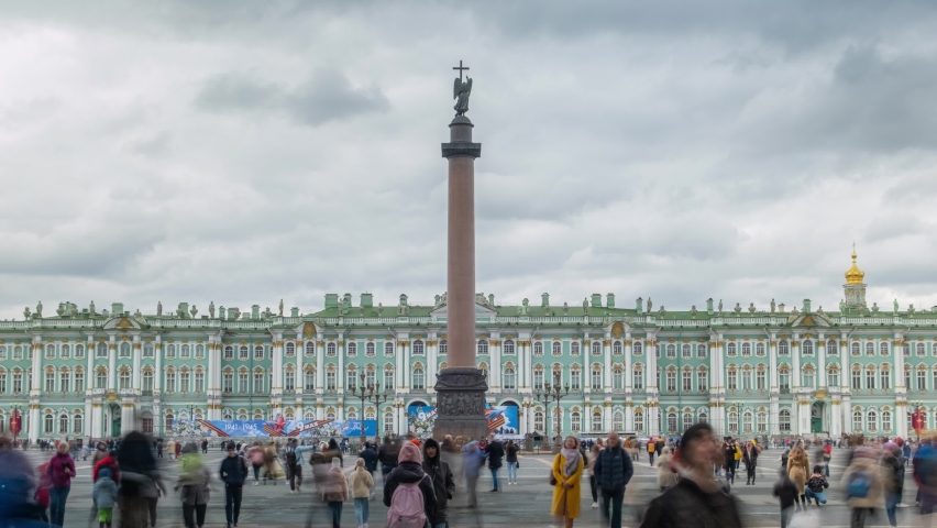 ST. PETERSBURG, RUSSIA - MAY, 2021: Palace Square, Alexander Column, Winter Palace and People. Saint-Petersburg, Russia. Motion Panning Time Lapse.