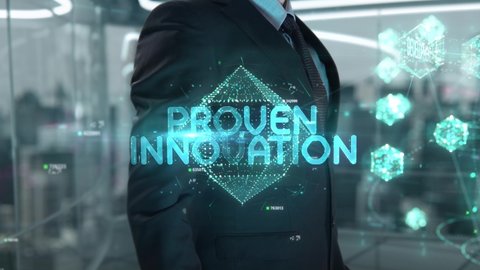 Businessman with Proven Innovation hologram concept