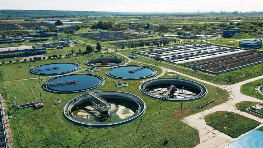 Aerial view of waste water treatment plant. Outdoor site with multiple wastewater plants