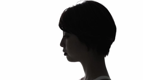 Silhouette of young asian woman profile. Mindfulness. Meditation.