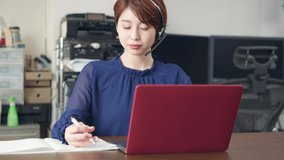 Young asian woman taking online class. Video conference. webinar. e-learning.