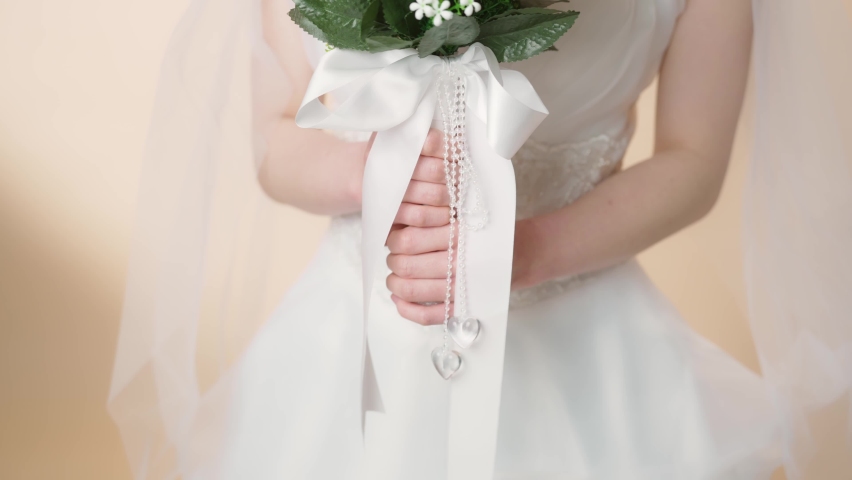 Young asian woman wearing wedding dress. Bridal concept.