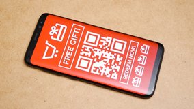 Man browsing various store coupons on his smartphone, finger swiping through many promo coupon code templates, lots of deals, sales discount codes, mobile advertisement, internet marketing concept - Powered by Shutterstock - Get 15% off with code: PIKWIZARD15