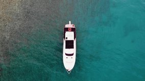 yacht waiting in the bay aerial view of the yacht blue sea air check summer vacation