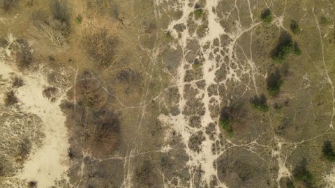 Mewia Lacha Nature Reserve, drone flying Directly Above Crusty spotty cracked Land Surface