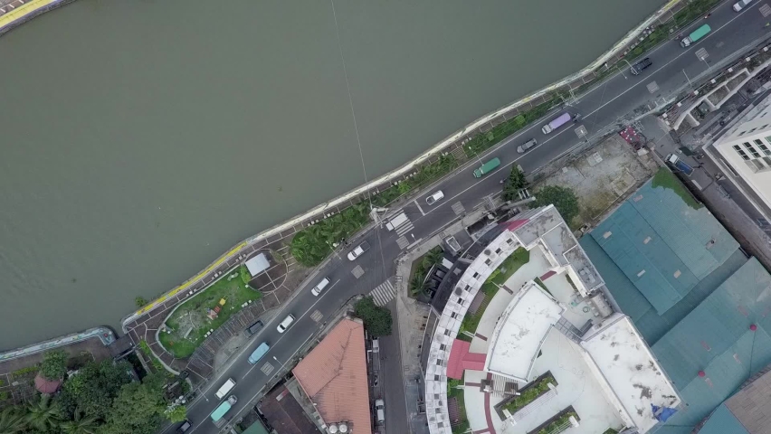 Top view of the Pasig River, separating the cities of Makati and Mandaluyong in Metro Manila
