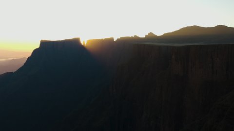 Aerial view of the sun rising over the spectacular Amphitheatre, Drakensberg, KwaZulu-Nata,South Africa