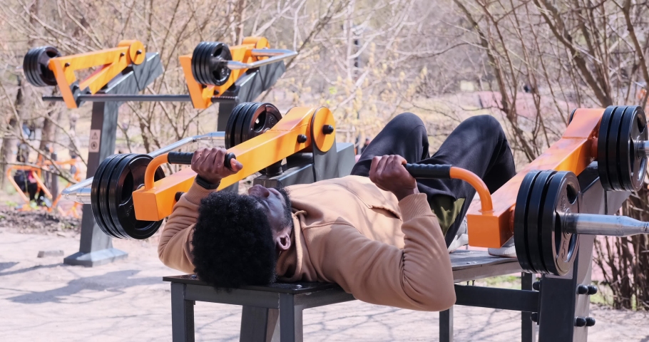 Man doing bench press exercise