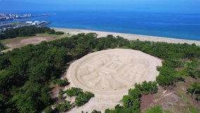 Drone video of popular tourist destinations in Kanonji city, Kagawa prefecture, Japan,
The letters in the photo are Japanese words for Kaneitsuuhou, meaning old coins.