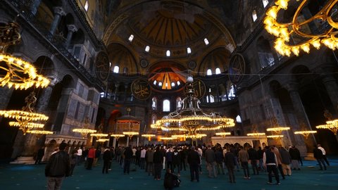 Fatih Istanbul Turkey April 21, 2021 Hagia Sophia Mosque official name
 Ayasofya-i Kebîr Câmi-i Şerîfi interior view people pray together in the holy month of Ramadan.