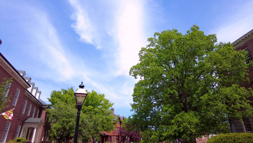 Panning footage of the Historical Maryland State Capitol building in Annapolis, the oldest state house that is still in use. Panning close up footage featuring the entrance and surrounding.