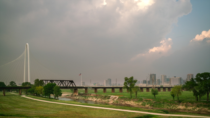 Time Lapse of Storm Clouds Over the Dallas Downtown Skyline from Large Park