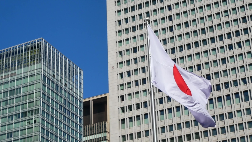 Japan flag with background of modern high-rise building in Tokyo,Japan
 Royalty-Free Stock Footage #1072047640