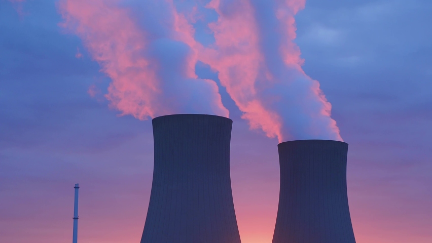 Nuclear power plant against  sky at sunset Royalty-Free Stock Footage #1072063780