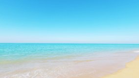 Cyan gradient sea water n calm ocean wave crashing Tropical summer sandy beach on beautiful sunny clear blue sky background in bright sunlight n sunshine day at Phuket Thailand, 4k cinemagraphs b-roll