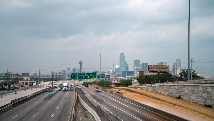 Time Lapse of Highway Traffic with Dallas Downtown Skyline in the background