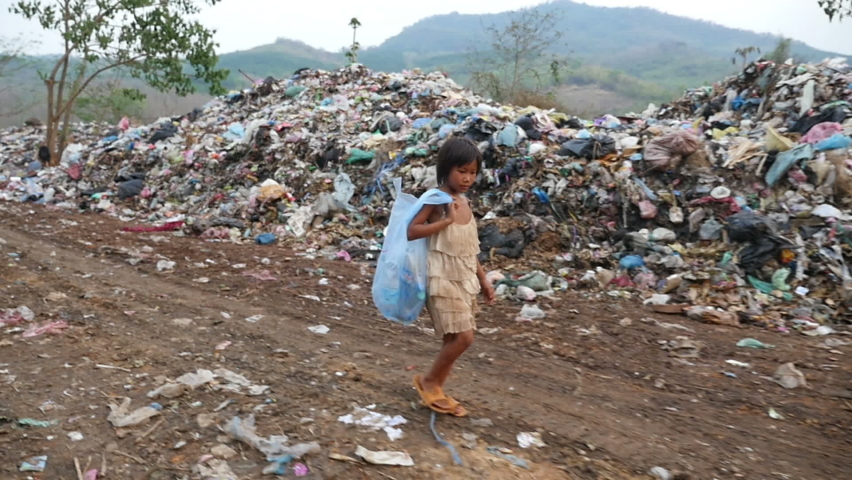 Poverty Kid Walking With Garbage Bag
 | Shutterstock HD Video #1072079605