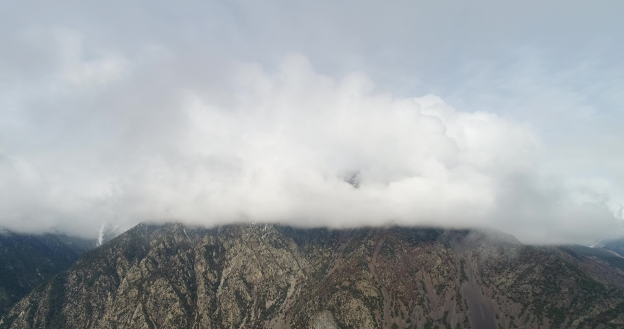Fog in the mountains. Andorra la Vella. Aerial view. Pyrenees mountains, Andorra. Aerial. Drone video
