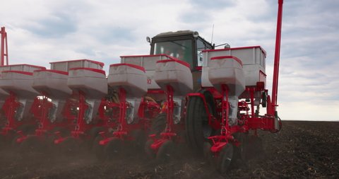 Agriculture Farm Tractor Seeding Machine Field Seeder Village Planter Rural Working Combine Tillage Plowing Agricultural Equipment Season Sowing Grain Spring time Process Planting Seeds Slow motion
