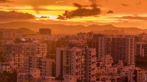 Colorful, Fiery Sunset, Cityscape View and Day to Night Time Lapse of City of Pune, Maharashtra, India, India