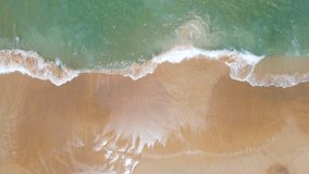 Professional Video. 4K Aerial view Top-View about beach sea sand. Beautiful nature video beach sea summer in sunny day.