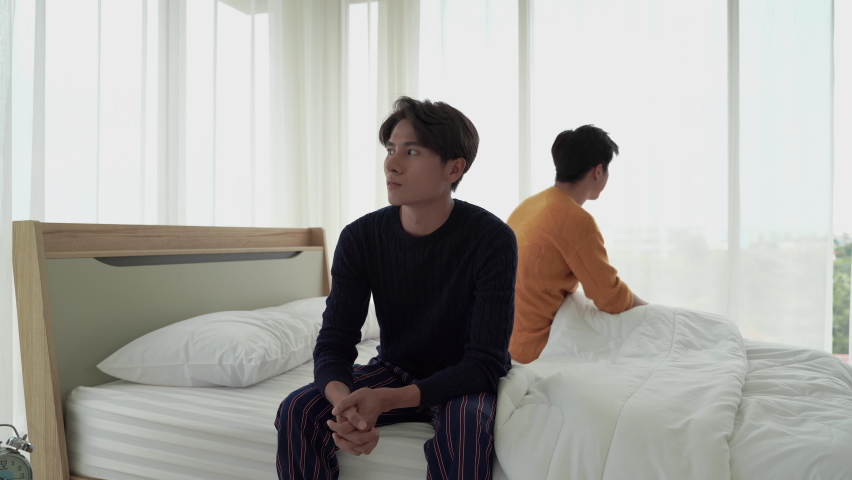 Gay couples are angry and grouchy in the bedroom, lgbt concept
