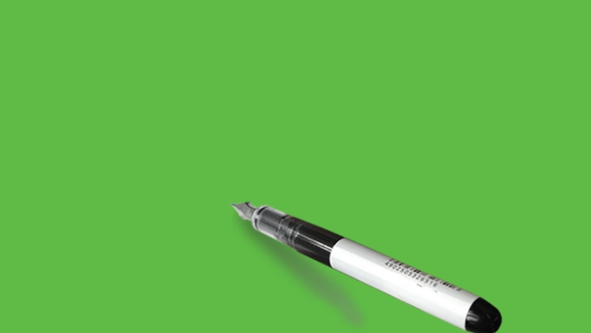 Drawing a video game remote with black,white and blue colour combination on abstract green background