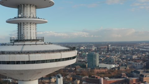 Reveal of Hamburg city skyline behind Heinrich Hertz TV tower rising above Hamburg urban cityscape