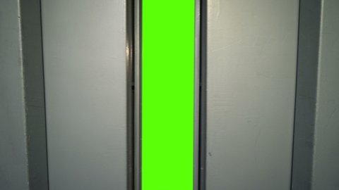 Close-up view of Old Elevator Open the Doors with Green Screen