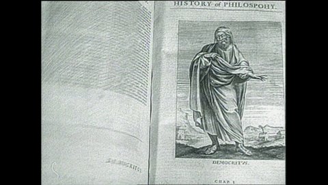 1940s: Ancient manuscript shows text and illustration of Democritus, the Greek Philosopher. Greek word for atom. Atom = indivisible. Image Lucretius, Roman poet and his atomic theories.