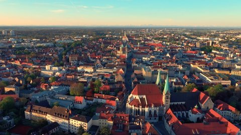 Drone flying through Augsburg city center. Cathedral, Ratskeller, St. Ulrich Church.
