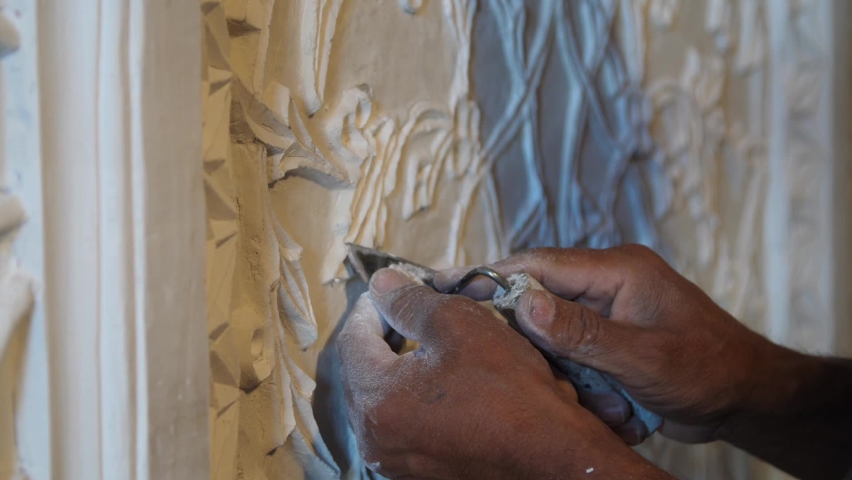 Carving Pattern in Plaster. High quality video footage Royalty-Free Stock Footage #1072137947