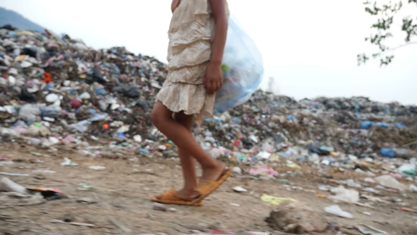 Poor Legs Kid Walking, Garbage At Background
 | Shutterstock HD Video #1072168136