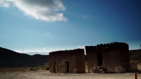 El Chorrillo, Almeria, Spain - January 12, 2020: Time lapse of clouds moving over El Chorrillo, movie location of "Games of Thrones" and "Exodus", Sierra Alhamilla, Spain.