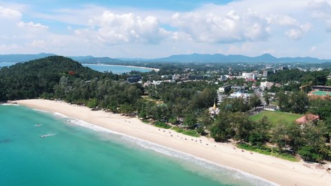 4k aerial view Phuket,Thailand sea, famous beach tourist destination no people, Surin Beach best island summer, landscape top view parasols sun seascape sunny, wave slow motion, umbrellas white sand