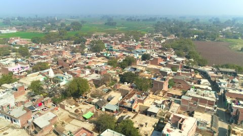 drone moves over the rural village giving a beautiful Aerial View of Rural Village of Uttar Pradesh, India