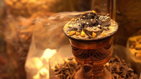 Gold Souk market. Dubai. UAE. Burning incense on the coals