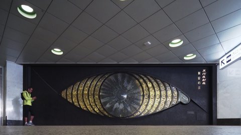 tokyo, japan - march 25 2020: Video of the eye-catching glass mosaic public art sculpture named the eye of shinjuku created by Japanese artist yoshiko miyashita in 1969 at Subaru building underground.