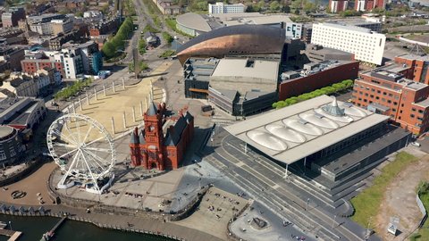 CARDIFF, WALES - APRIL 23 2021: Aerial drone view of the landmark buildings of Cardiff Bay. Cardiff is the capital city of Wales.
