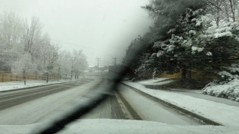 POV footage of driving in snow storm