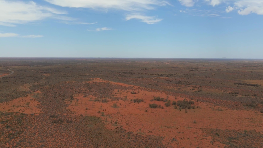 Desolate Desert At Red Centre Near Ayers Rock, Uluru-Kata Tjuta National Park In Northern Territory, Australia. - Static Wide Shot