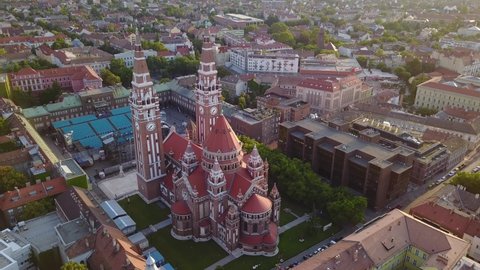 Cinematic aerial drone footage of Votive Church of Szeged and Szeged, a charming historical European city on the banks of the Tisza river on the Southern Great Plane of Hungary