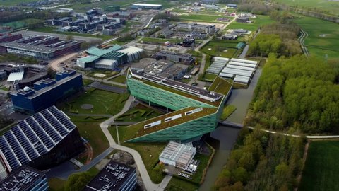 GRONINGEN, NETHERLANDS - 01. MAY 2021: 4k birds eye view of Linnaeusborg and Zernike campus on a sunny day